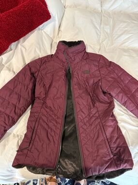 The North Face Women's Reversible Quilted Puffer Jacket in Plum